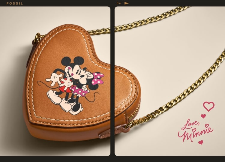 Ce sac en cuir brun en forme de cœur est bordé d’une bande de film. Mickey et Minnie sont embossés sur le devant. Les mains de Mickey tiennent un cœur dans le coin inférieur gauche.