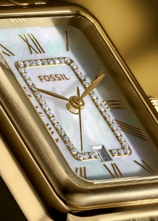 Close-up of the Raquel watch dial, featuring mother-of-pearl and crystal accents.