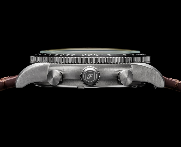 A side profile of our Sport Tourer watch, showcasing its knurled crown with an F.
