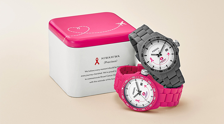 Dose und Uhr mit Brustkrebs-Logo